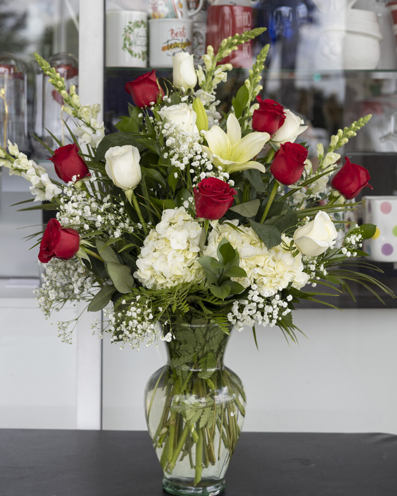 Combined floral arrangement Red and White roses