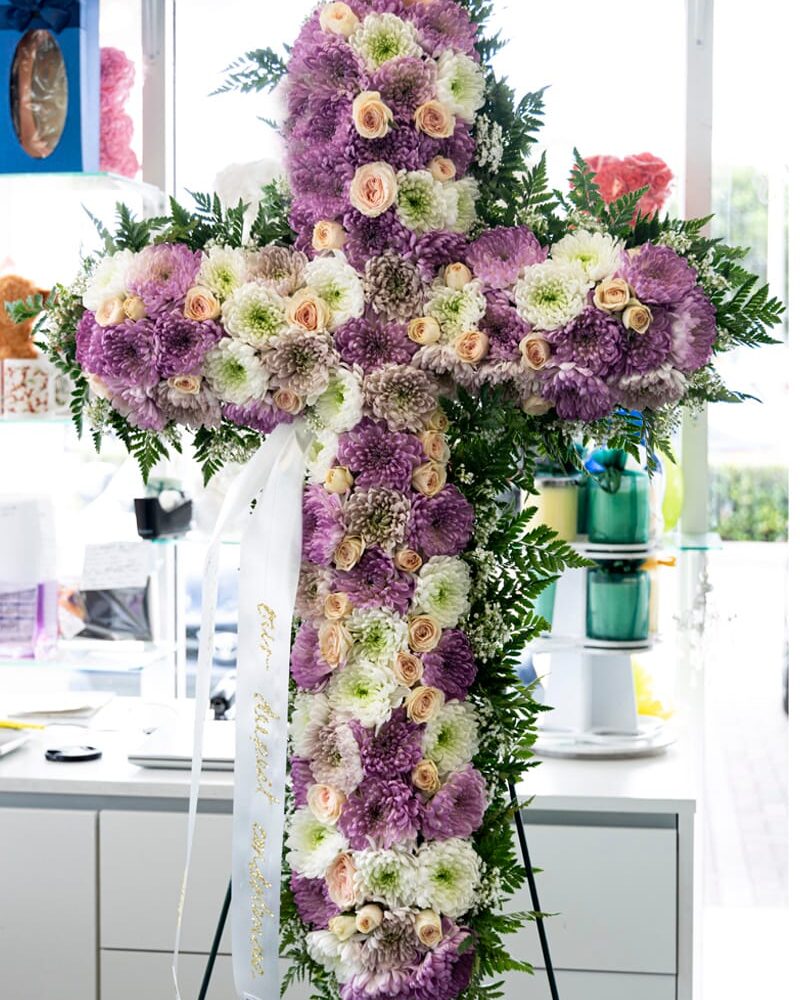 Love Cross: A symbolic funeral floral tribute