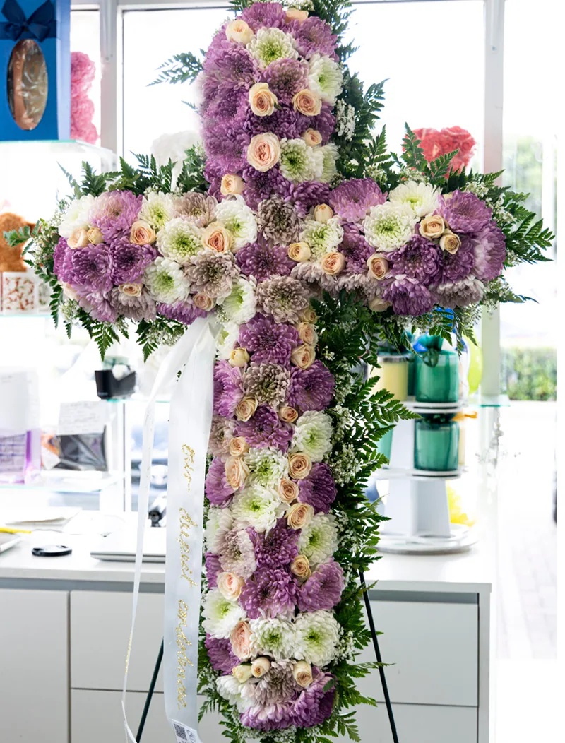 Love Cross: A symbolic funeral floral tribute