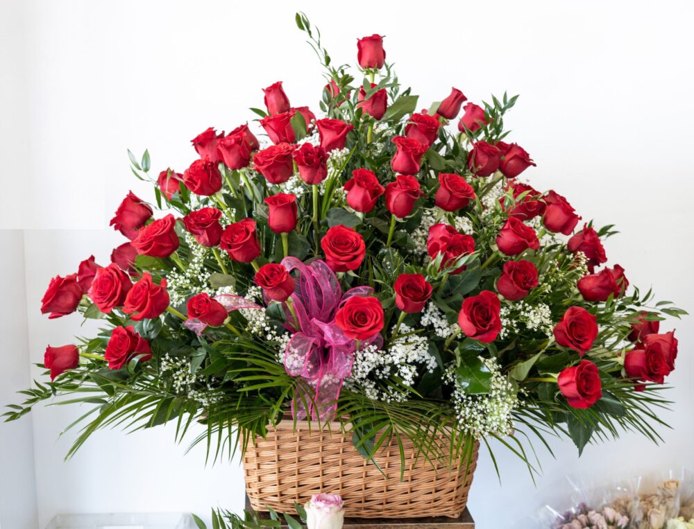 100 Red Roses and green filling. Basket