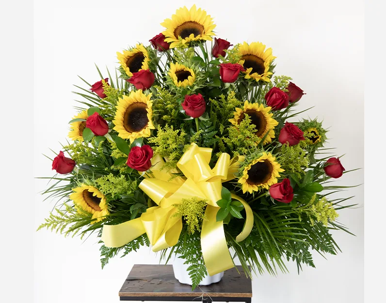 Basket Sunflowers and red Roses